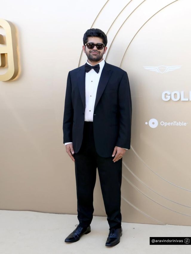 Perplexity Founder Aravind Srinivas Net Worth, Journey, Vision & Growth 2 Aravind Srinivas, founder of Perplexity AI, looks sharp in a formal black tuxedo and bowtie while posing at a red carpet event.